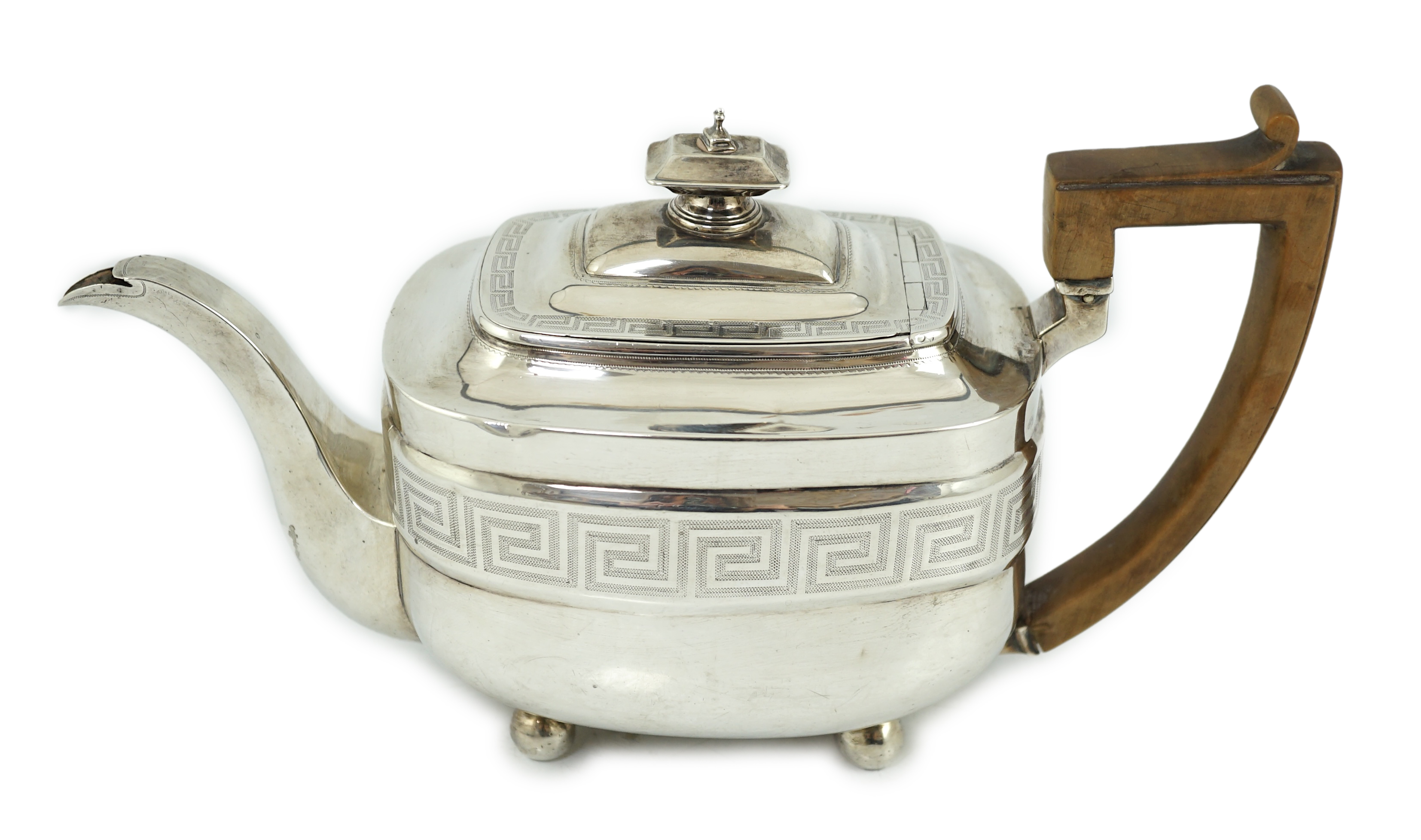 A George III silver shaped rectangular teapot, by Soloman Hougham,`